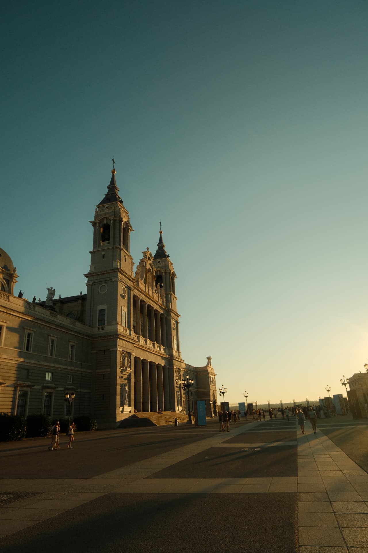 Almudena Cathedral in golden evening light with long shadows