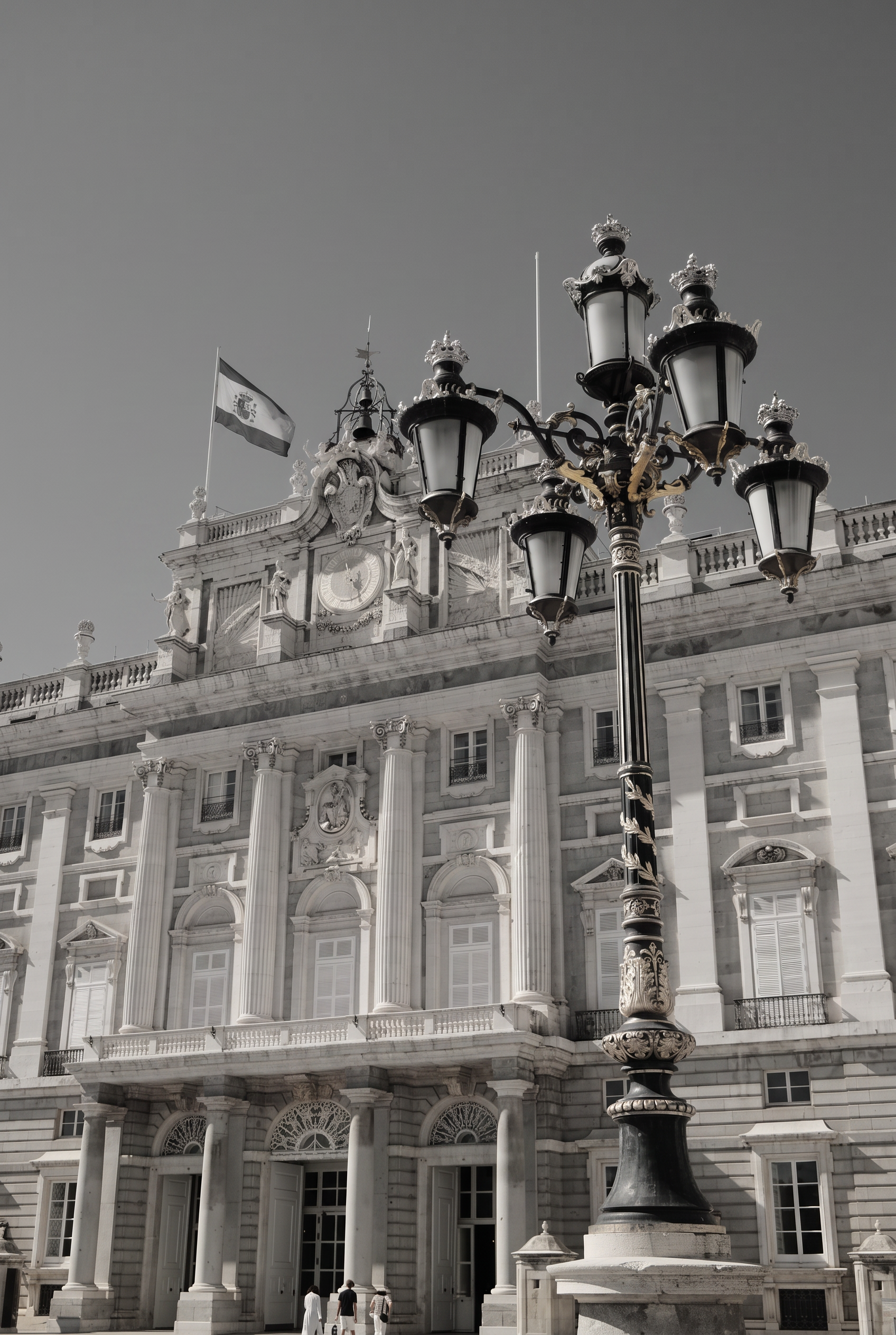 Gilded lamp post in front of the Royal Palace of Madrid